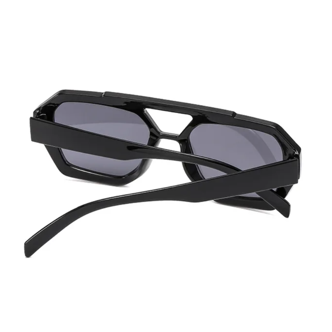 Ravena aviator women's shades in Black frame with black lenses, rear view with temples half-crossed on white background