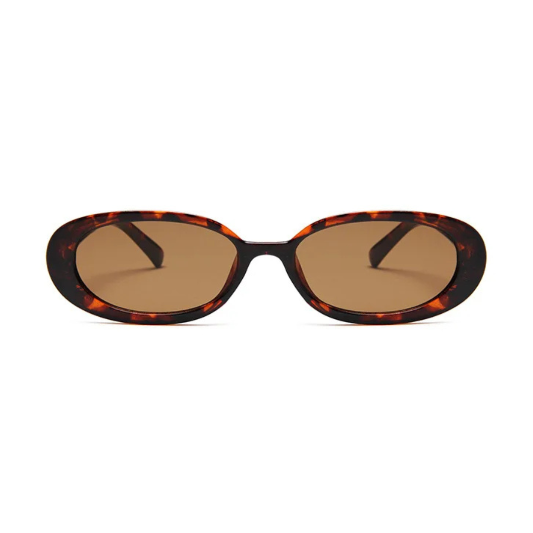 Amélie oval women's sunglasses in Tortoise polycarbonate frame with amber acrylic lenses, 100% UV protection, front view on white background
