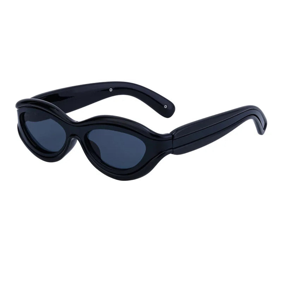 Right 3/4 angle of Isla women’s oval sunglasses in Black frame with Black lenses, on white background — acetate frame, TAC lenses, 100% UV protection