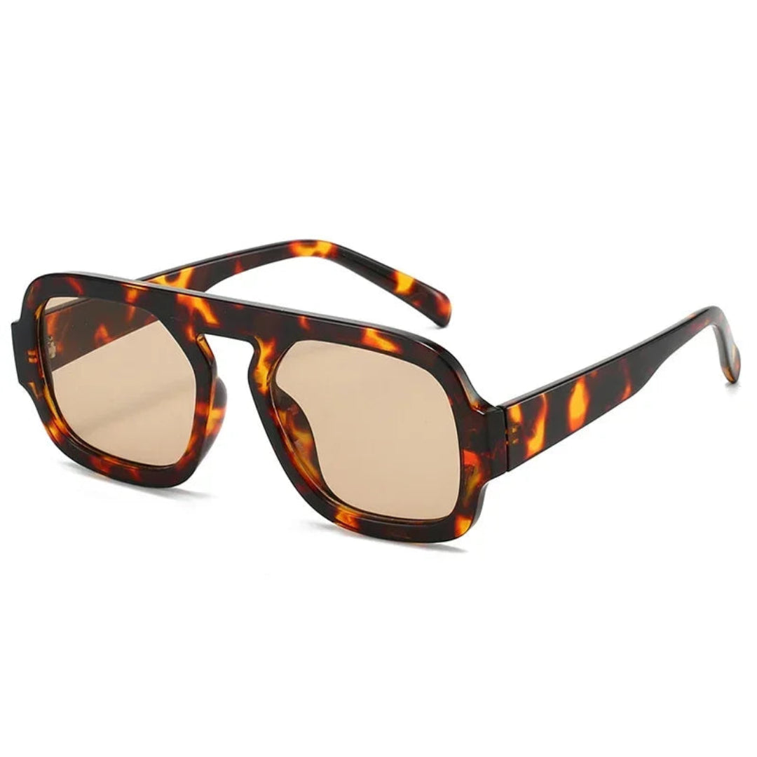 Zara women’s sunglasses in Tortoise frame with Amber lenses, right 3/4 angle on white background — acetate frame, TAC lenses, 100% UV protection