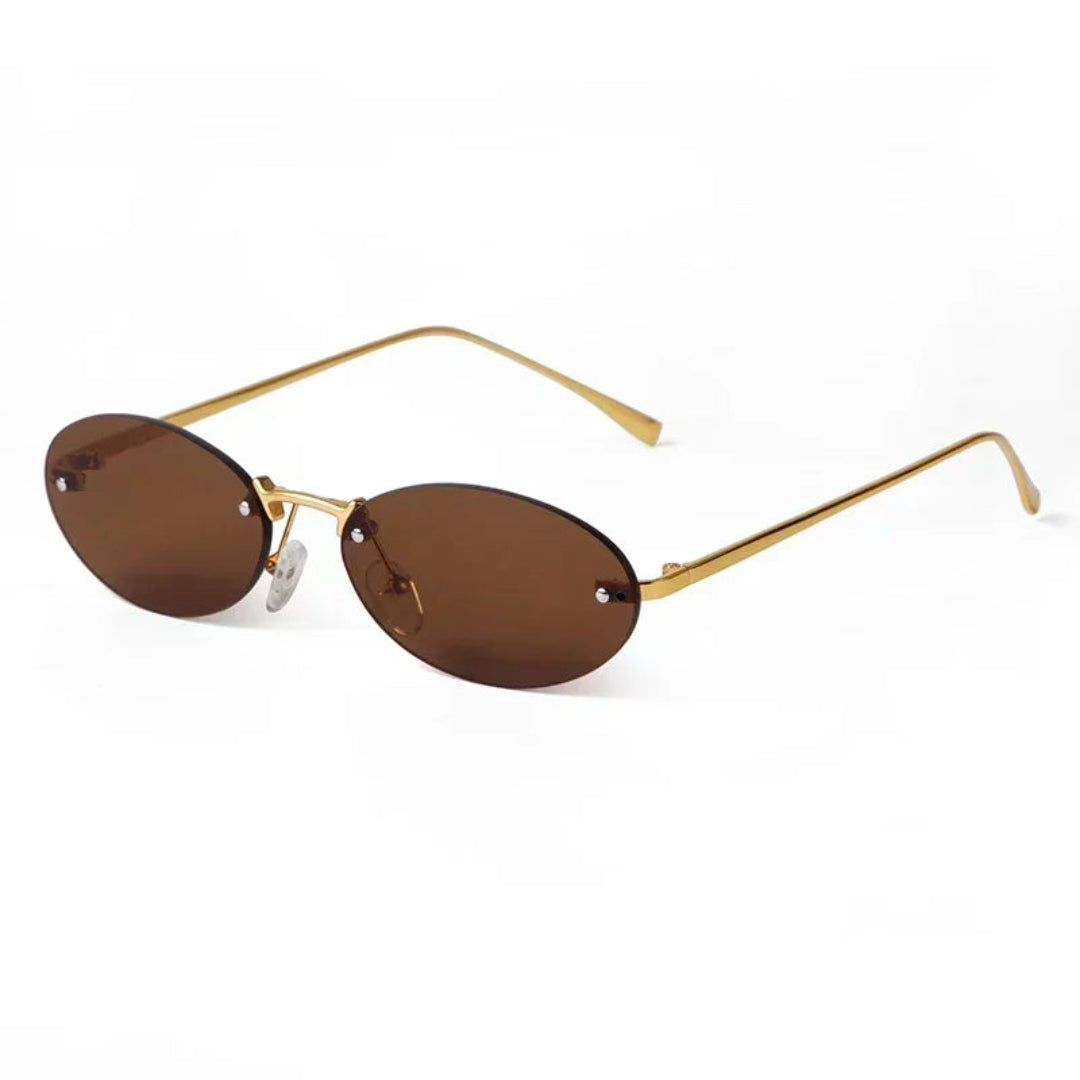 Velvet women’s oval shades in Gold frame with Brown lenses, right 3/4 angle on white background — metal frame, acrylic lenses, 100% UV protection