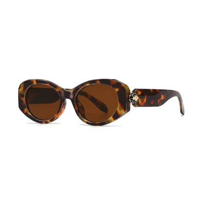 Selene women’s wide oval shades in Tortoise frame with Amber lenses, left 3/4 angle on white background — acetate frame, TAC lenses, 100% UV protection