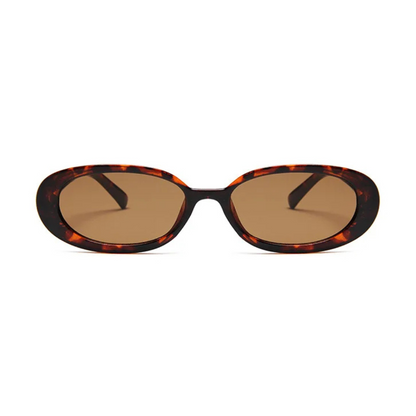 Amélie oval women's sunglasses in Tortoise polycarbonate frame with amber acrylic lenses, 100% UV protection, front view on white background