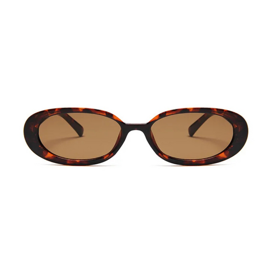 Amélie oval women's sunglasses in Tortoise polycarbonate frame with amber acrylic lenses, 100% UV protection, front view on white background