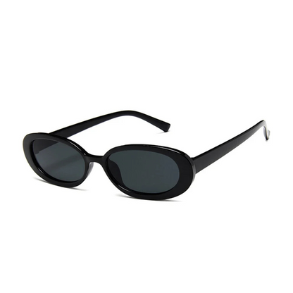 Amélie oval women's sunglasses in Black polycarbonate frame with black acrylic lenses, 100% UV protection, right 3/4 angle on white background