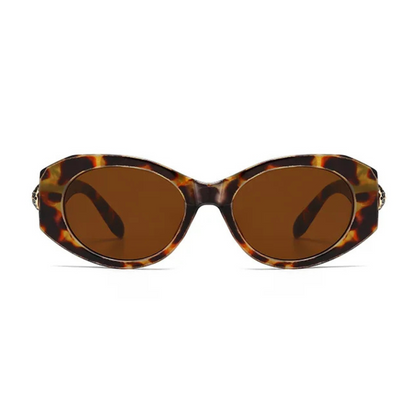 Front view of Selene women’s wide oval  shades in Tortoise frame with Amber lenses, on white background — acetate frame, TAC lenses, 100% UV protection