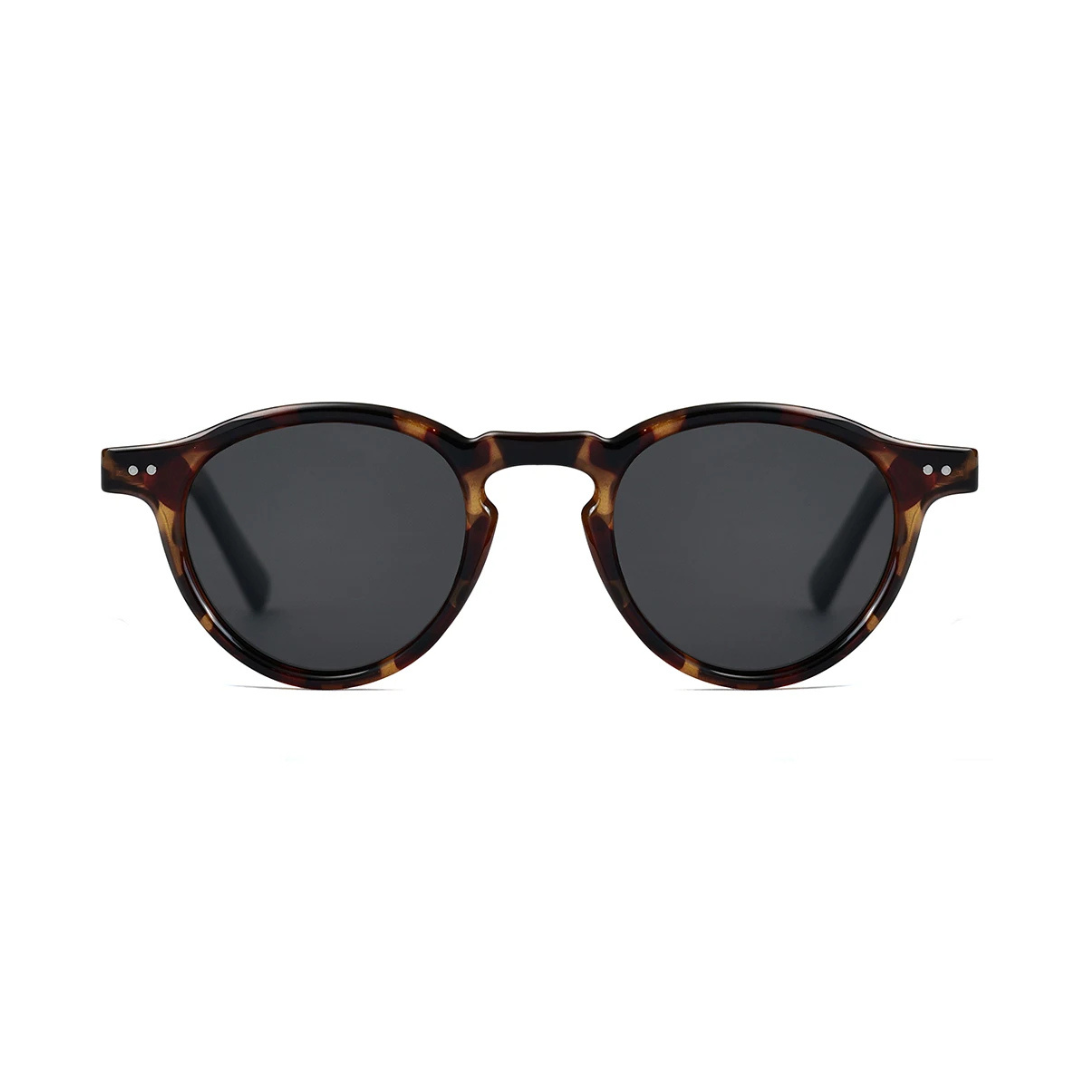 Front view of Solis women’s round sunglasses in Tortoise frame with Black lenses, on white background — acetate frame, TAC lenses, 100% UV protection