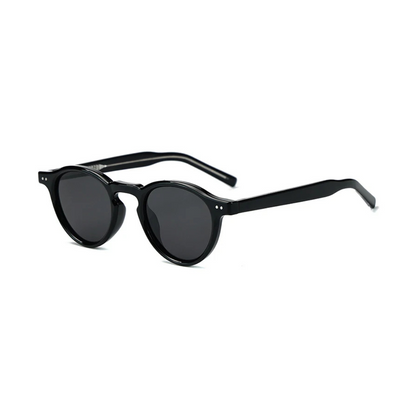 Solis women’s round sunglasses in Black frame with Black lenses, right 3/4 angle on white background — acetate frame, TAC lenses, 100% UV protection