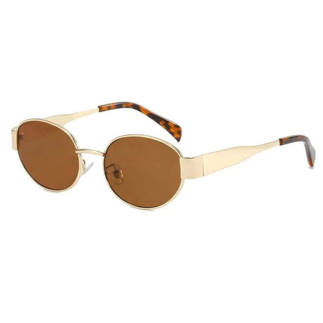 Right 3/4 angle of Aurora women’s retro oval sunglasses in Gold frame with Amber lenses, on white background — stainless steel frame, polycarbonate lenses, UV400 protection