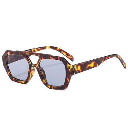 Ravena aviator women's sunglasses in Tortoise frame with soft blue lenses, right 3/4 angle on white background