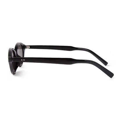 Side view of Sovereign women’s oval slim sunglasses in Black frame with Black lenses, on white background — polycarbonate frame, acrylic lenses, 100% UV protection