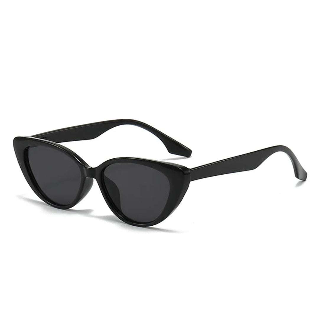 Right 3/4 angle of Noire women’s cat-eye shades in Black frame with Black lenses, on white background — polycarbonate frame, acrylic lenses, 100% UV protection