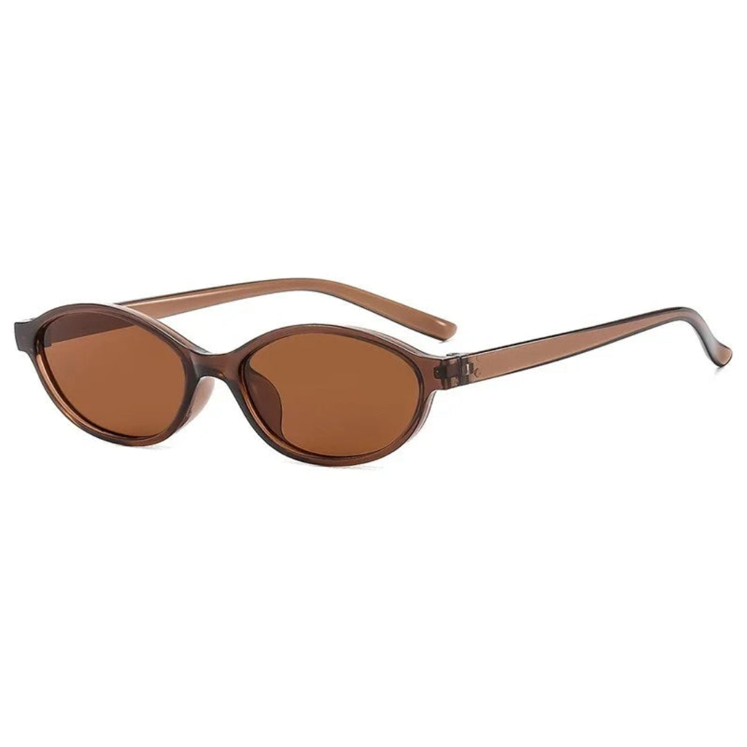 Boldé oval slim women's sunglasses in Amber polycarbonate frame with amber polycarbonate lenses, 100% UV protection, right 3/4 angle view on white background