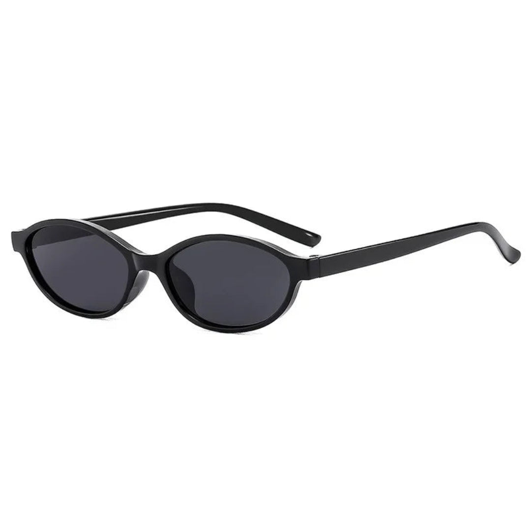 Boldé oval slim women's sunglasses in Black polycarbonate frame with black polycarbonate lenses, 100% UV protection, right 3/4 angle view on white background
