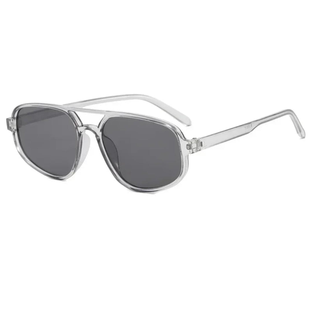 Brigitte aviator women's sunglasses in transparent polycarbonate frame with black acrylic lenses, 100% UV protection, right 3/4 angle view on white background